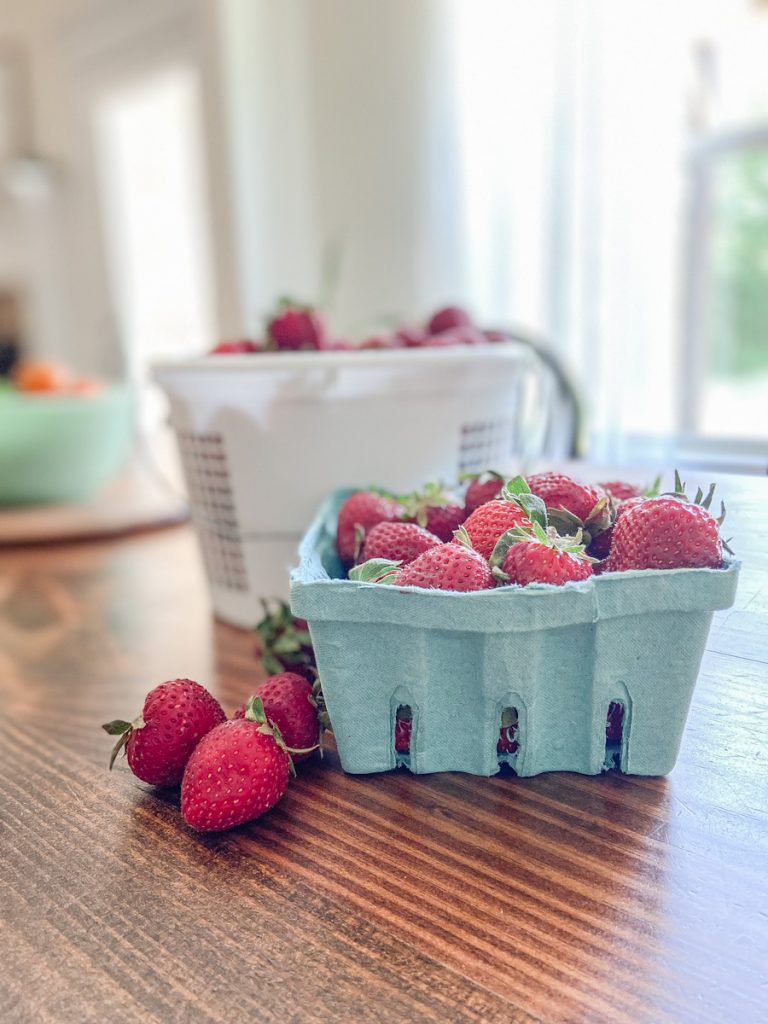 strawberries in container on table
