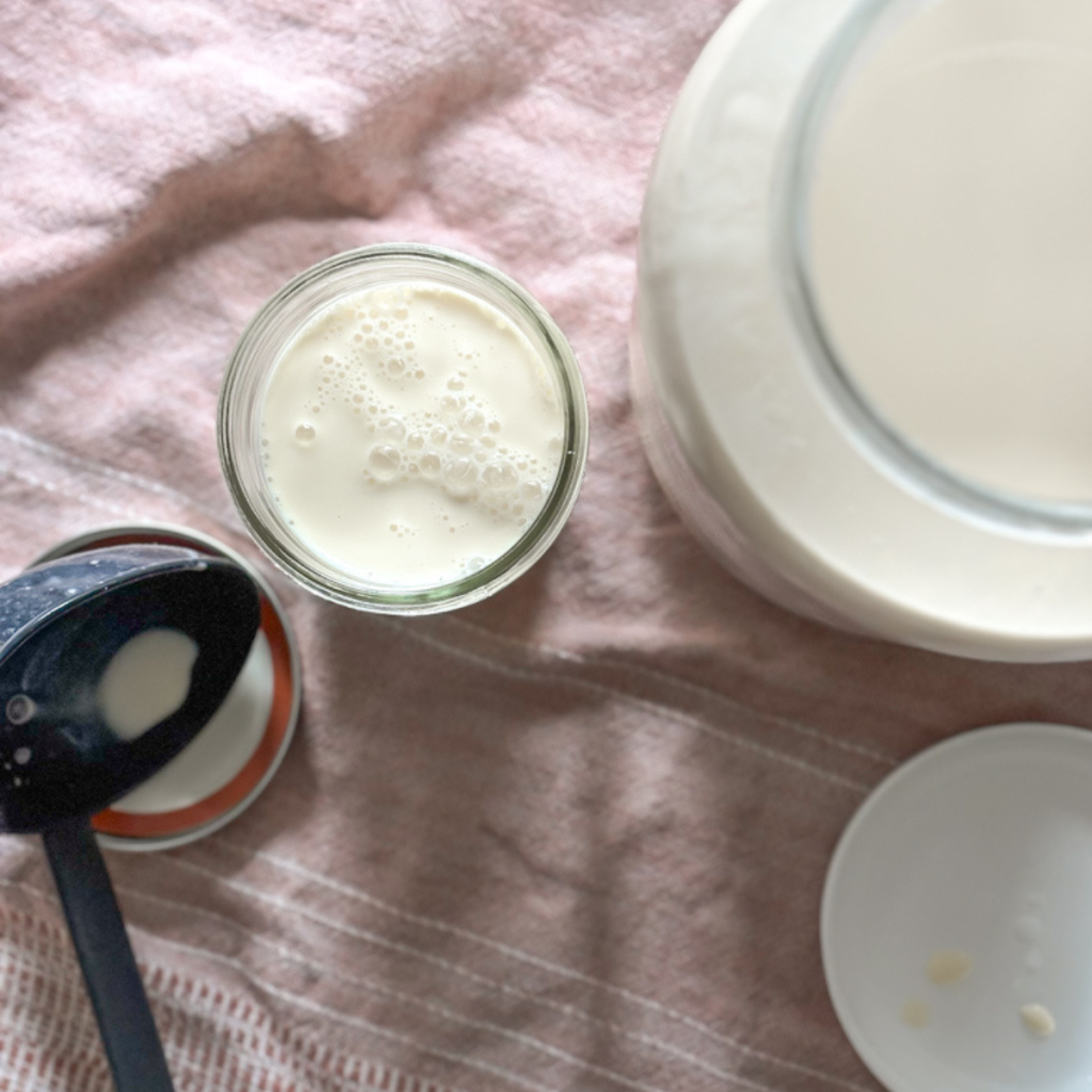 heavy cream in a glass jar 