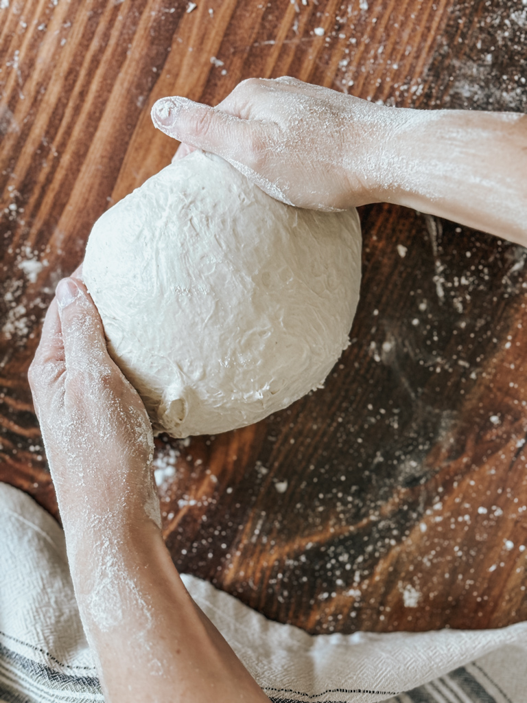 shaping sourdough bread