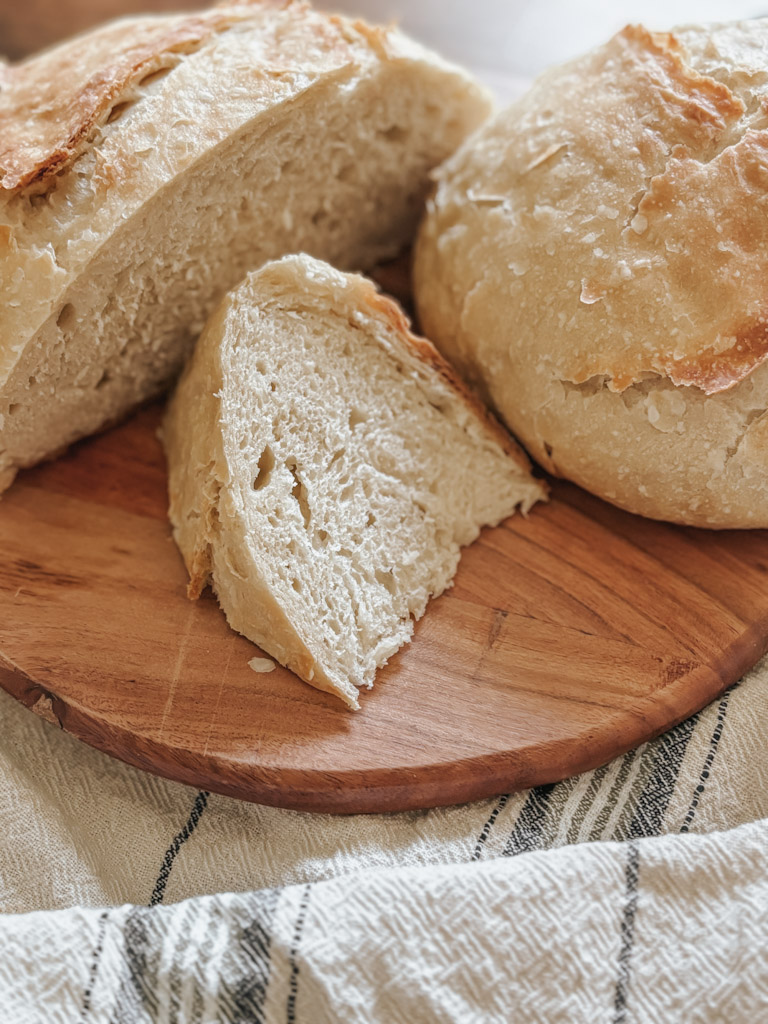 Sliced sourdough bread on cutting board