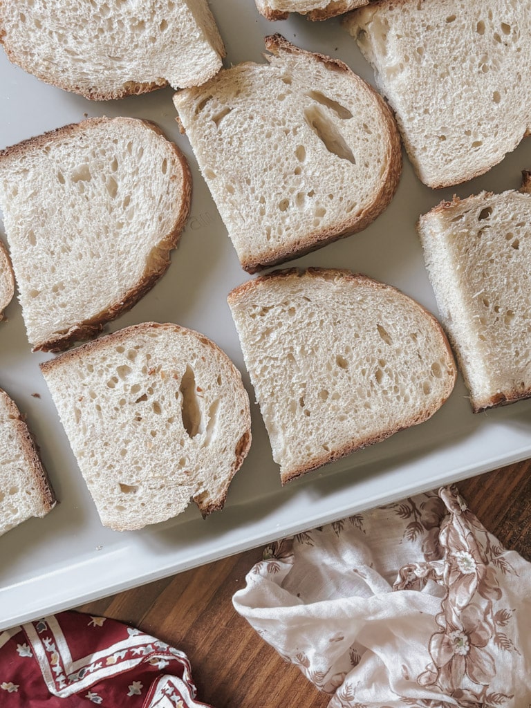 Slices of sourdough bread on a pan