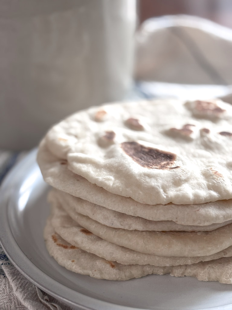 flatbread stacked on a plate