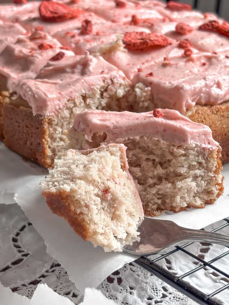 closeup of a slice of strawberry sheetcake 