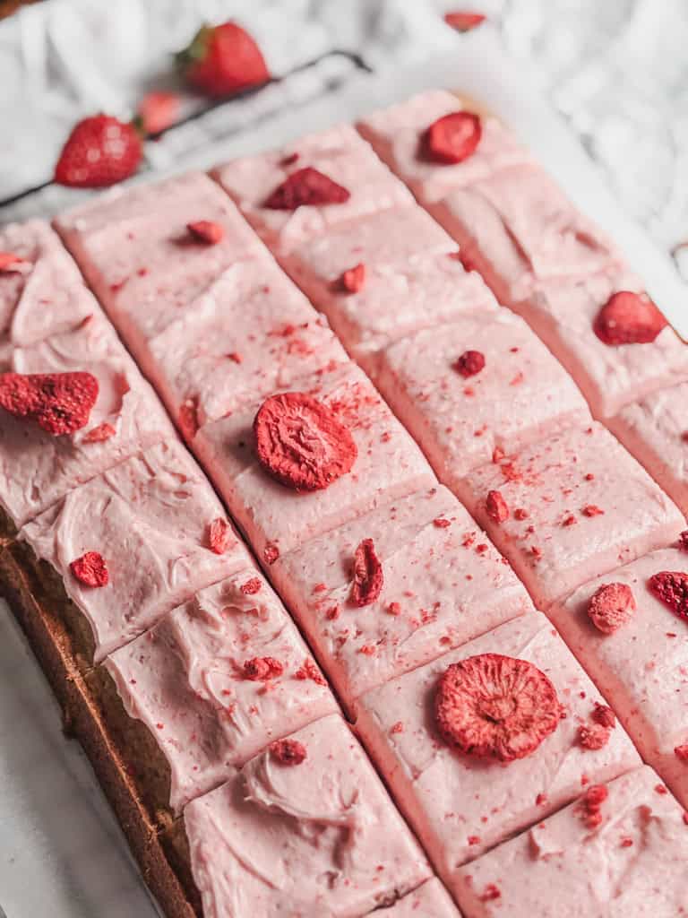 strawberry sheetcake cut into squares