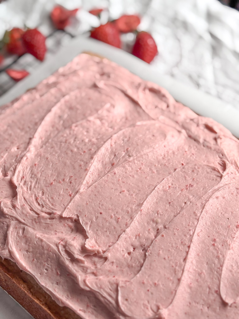 strawberry sheetcake frosted with strawberry icing