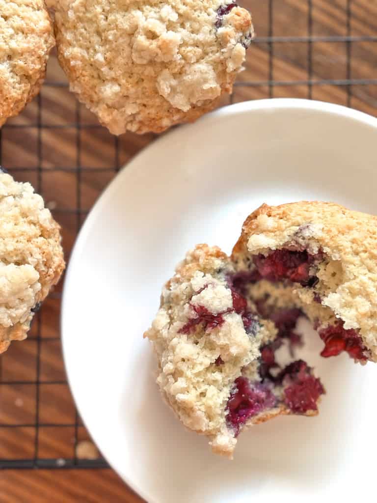 opened blueberry muffin on a plate