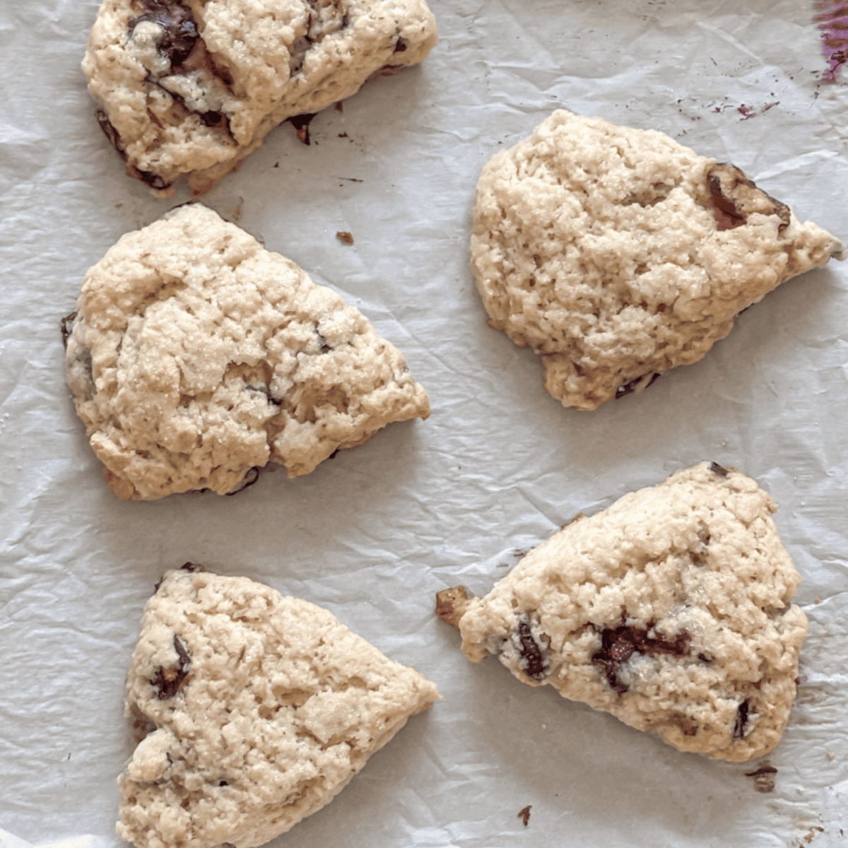 sourdough discard scones on a sheet of parchment paper