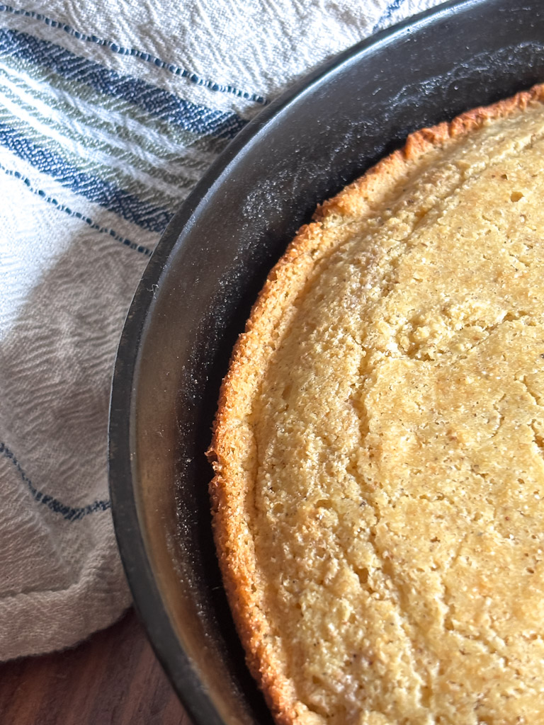 clost up of cornbread in a cast iron skillet