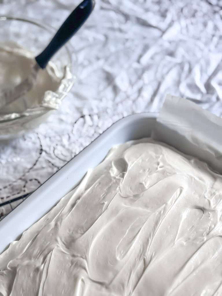 sheet cake frosted with white frosting
