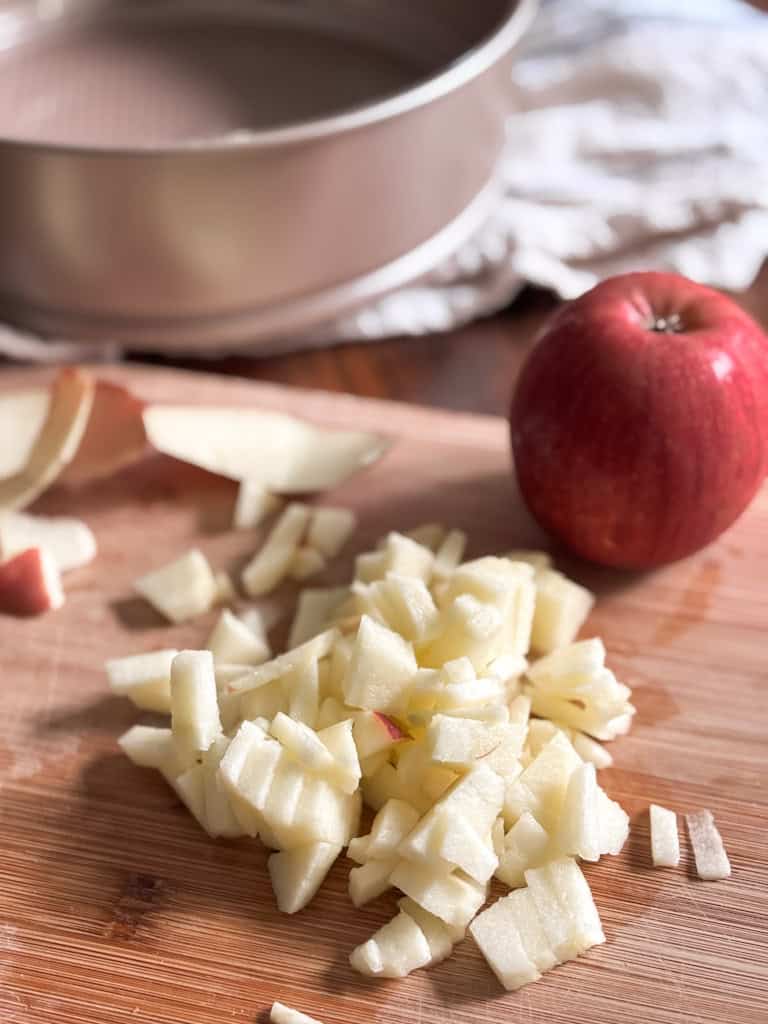 diced apples on a cutting board