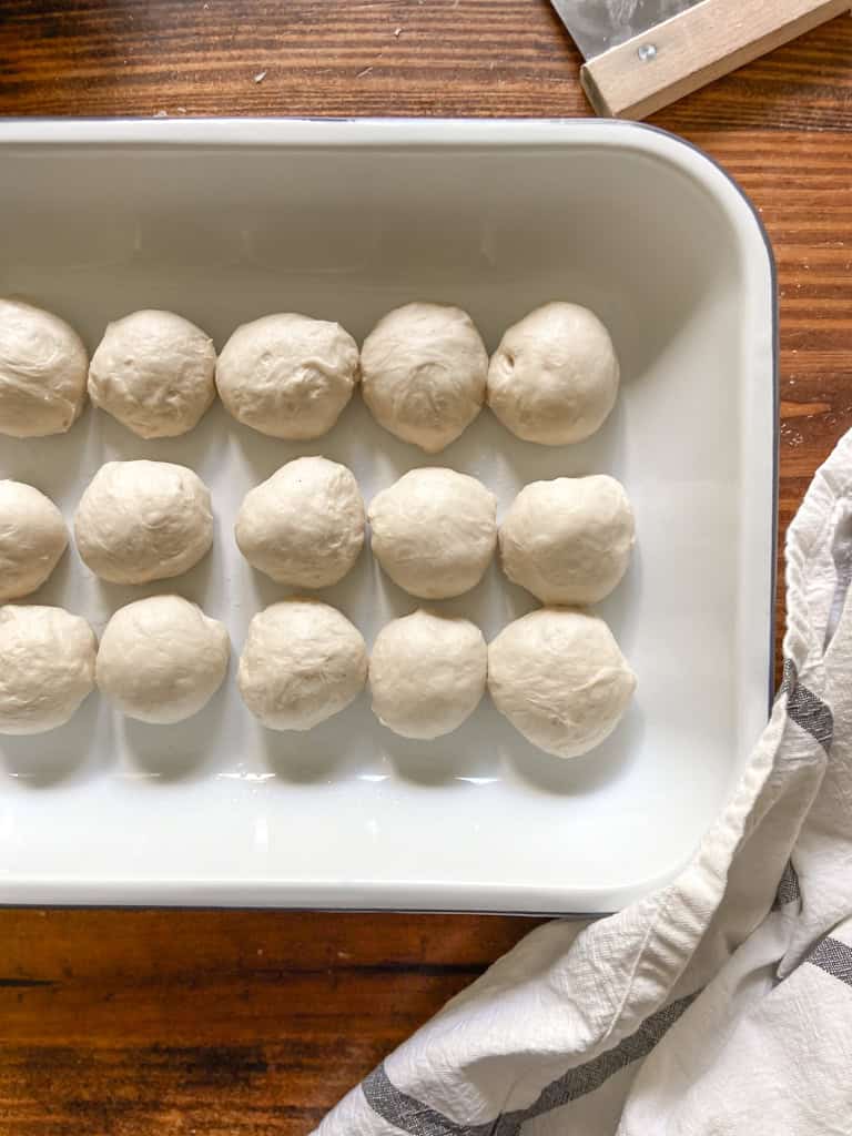 pan of dough balls on a table in a pan 