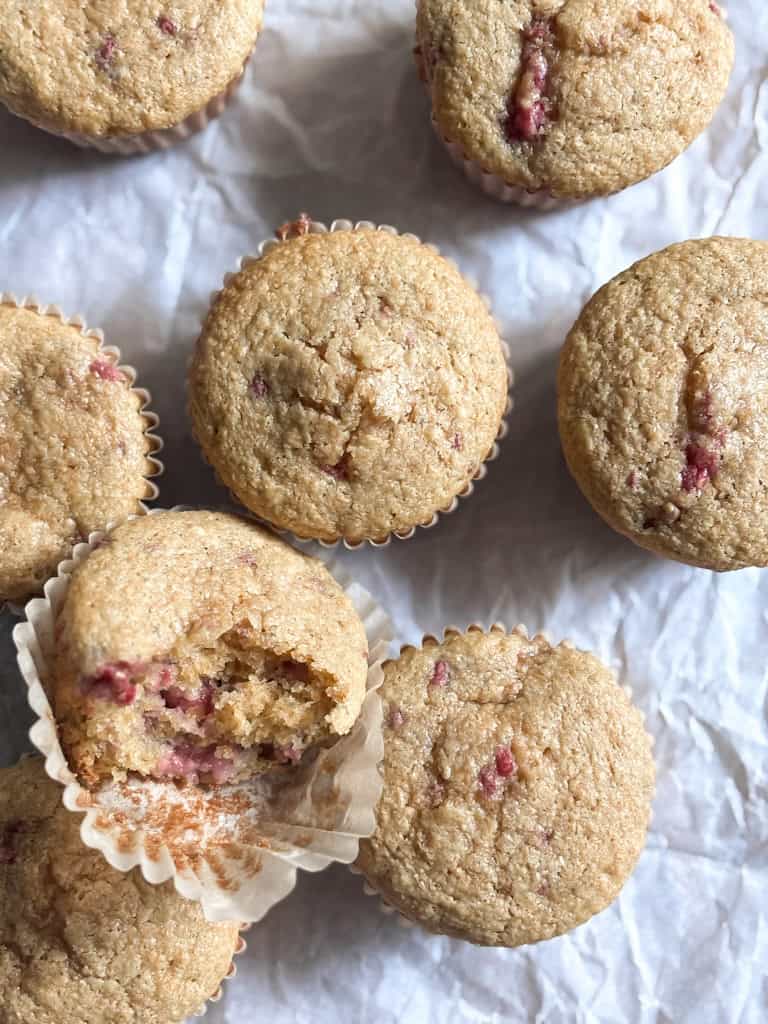to view of fresh milled muffins on a piece of parchment paper