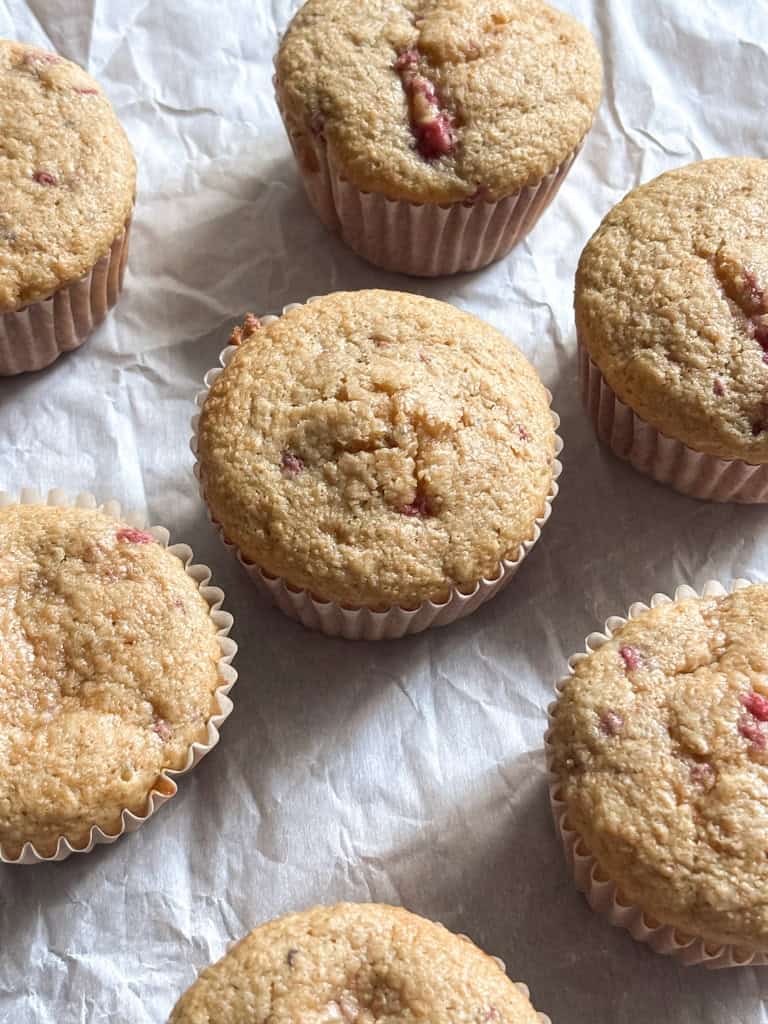 fresh milled muffins on a piece of parchment paper
