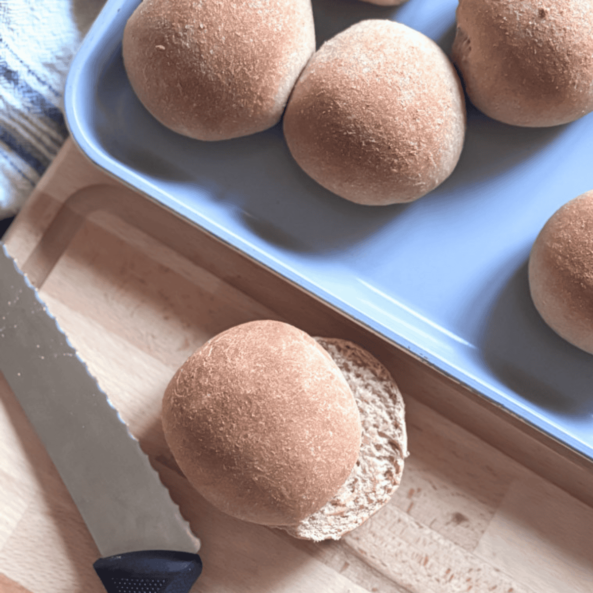 Soft, round bread balls on a baking tray, perfect for fresh bakery homemade bread.